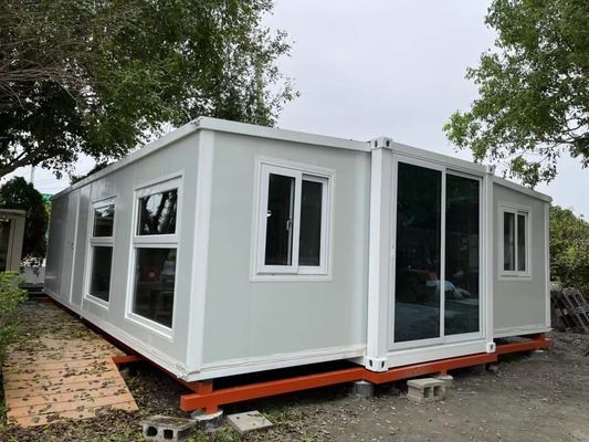 comprar Casa de contêineres expansível de 30 pés com porta de segurança de aço 56 metros quadrados Área do chão e opções de cores personalizáveis Fabricação em linha